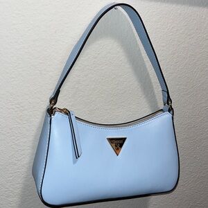 Brand new, never worn vintage baby blue Guess mini purse! Perfect for summer!